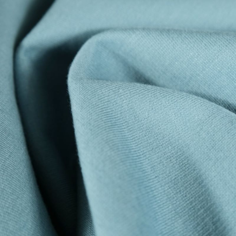 くすみブルーのストレッチ素材の布地