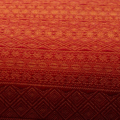 幾何学模様のオレンジの布地