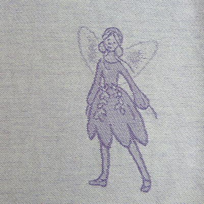 紫の妖精が描かれた布地