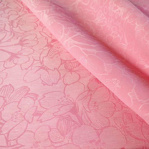 異なるピンク色のリバーシブル仕様の花柄模様の布地
