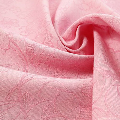 ピンク色の桜のはなびらが描かれた布地