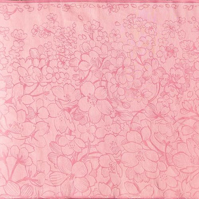 桜が舞い散る様子が描かれたピンク色の布地