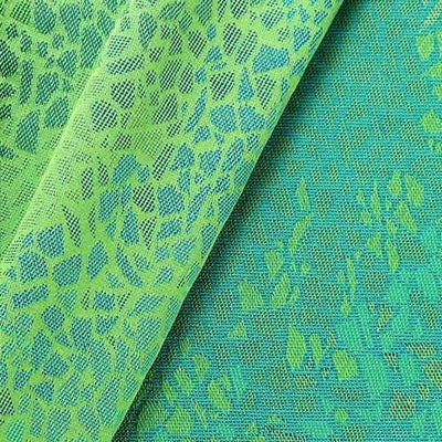 緑色のモザイク柄の織物