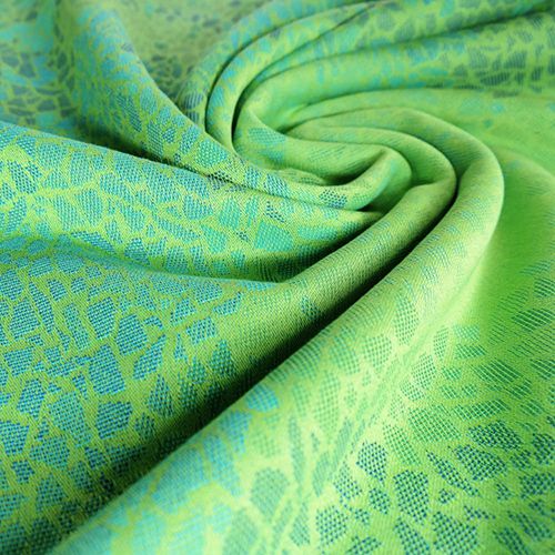 グリーンのモザイク模様が綺麗な布地
