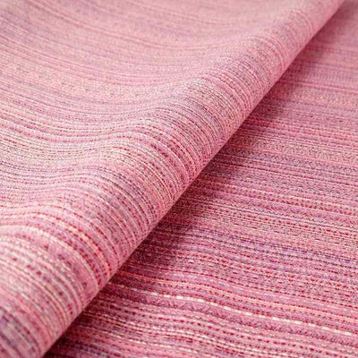 ピンク、赤、白、紫の糸を使用したローズピンクの織物