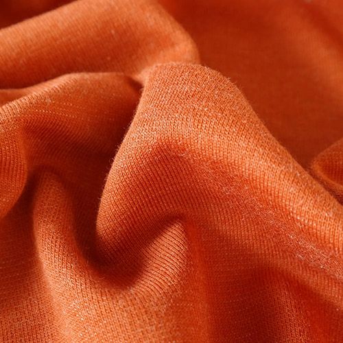 １０％シルク混、オーガニックコットン９０％のオレンジ色の布地