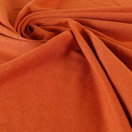 コッパ―色のストレッチ性のある布地